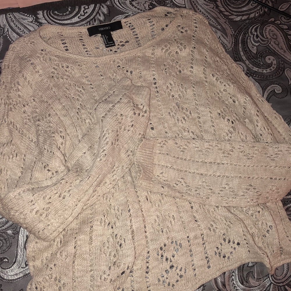 Cropped cream knitted sweater